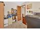 Home office with filing cabinets, shelving, and a rolling office chair at 601 N Garfield Ave, Deland, FL 32724