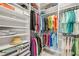 Well-organized closet with ample shelving and hanging space for clothes and accessories at 660 Mosaic Blvd, Daytona Beach, FL 32124