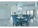 Bright clubhouse featuring high ceilings, modern furniture and tables with seating, perfect for community gatherings at 660 Mosaic Blvd, Daytona Beach, FL 32124