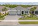 Charming single-Gathering home with meticulous landscaping and a paver driveway at 660 Mosaic Blvd, Daytona Beach, FL 32124