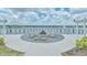 Outdoor firepit area with seating overlooking the lake, perfect for community gatherings at 660 Mosaic Blvd, Daytona Beach, FL 32124