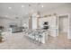Modern kitchen with granite countertops, stainless steel appliances, pendant lights, and an open view to the living room at 660 Mosaic Blvd, Daytona Beach, FL 32124