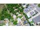 High aerial shot of a home in a neighborhood with easy access to nearby commercial areas at 68 Spring Lake Dr, Debary, FL 32713