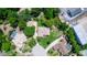 Expansive aerial view of a home with lush green landscaping and neighboring properties at 68 Spring Lake Dr, Debary, FL 32713