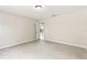Bright bedroom featuring neutral walls and carpet, offering a simple and welcoming atmosphere at 688 Cumberland Rd, Deland, FL 32724