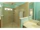 Modern bathroom featuring a walk-in shower and vanity at 6917 Vintage Ln, Port Orange, FL 32128