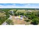 This is an aerial shot of the house with green fields nearby at 793 Timothy St, Ormond Beach, FL 32174