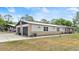 Wide view of property, highlighting the carport and garage at 793 Timothy St, Ormond Beach, FL 32174