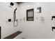 Walk-in shower with subway tile, stone mosaic inset and built-in bench at 793 Timothy St, Ormond Beach, FL 32174
