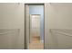 Spacious walk-in closet with wire shelving and a door to another room at 8231 Sw 79Th Ct, Ocala, FL 34476