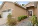 Charming home exterior featuring a two-car garage, well-maintained landscaping, and a stone walkway at 8231 Sw 79Th Ct, Ocala, FL 34476