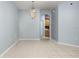 Open-concept room with tile flooring, chandelier and neutral wall color at 8231 Sw 79Th Ct, Ocala, FL 34476
