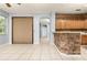 Open living space with tile floors, recessed lighting, and view of kitchen area at 8231 Sw 79Th Ct, Ocala, FL 34476