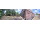 Spacious backyard featuring brick detail, with plenty of room for outdoor activities at 891 S Atmore Cir, Deltona, FL 32725