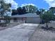 Well-maintained home with a neat front yard and a classic mailbox at 891 S Atmore Cir, Deltona, FL 32725