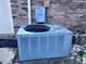 Close-up of a modern RUUD AC unit on the exterior of the home at 891 S Atmore Cir, Deltona, FL 32725