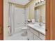 Bathroom featuring a tub and shower at 941 Village Lake N Dr, Deland, FL 32724