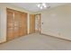 Bedroom featuring a closet and entry to the hall at 941 Village Lake N Dr, Deland, FL 32724