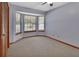 Bedroom featuring a bay window, closet, and natural light at 941 Village Lake N Dr, Deland, FL 32724