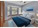 Bedroom with a bay window, closet, and ample natural light at 941 Village Lake N Dr, Deland, FL 32724