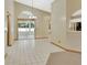 Dining room features tile flooring and glass doors to lanai at 941 Village Lake N Dr, Deland, FL 32724