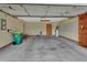 Spacious garage with ample storage and work space at 941 Village Lake N Dr, Deland, FL 32724