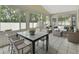 Bright sunroom with large windows at 941 Village Lake N Dr, Deland, FL 32724