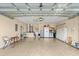Spacious garage with ample storage space and a clean, polished floor at 979 Leyburn Dr, Deltona, FL 32725