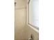 Close-up of a tiled shower with a showerhead and window at 979 Leyburn Dr, Deltona, FL 32725
