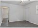 Bright bedroom featuring neutral walls, polished floors, and a simple design, creating a blank canvas for personalization at 706 W Franklin Ave, Deland, FL 32720