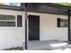 Close-up showcasing the front door and entrance with clean lines, fresh paint, and a welcoming feel at 706 W Franklin Ave, Deland, FL 32720
