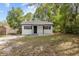 Inviting single-story home with classic details and a neatly landscaped yard, offering a charming curb appeal at 706 W Franklin Ave, Deland, FL 32720