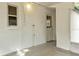 Concrete patio, cinderblock walls and white paint at 706 W Franklin Ave, Deland, FL 32720
