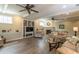 Spacious finished basement with fireplace, entertainment center, and wood flooring at 10 Foxhunter Flt, Ormond Beach, FL 32174