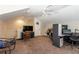 Cozy bonus room with neutral carpet and built-in desk area, perfect for an office or den at 10 Foxhunter Flt, Ormond Beach, FL 32174