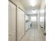 Well-organized laundry room offers storage and efficient appliances, perfect for household tasks at 10 Foxhunter Flt, Ormond Beach, FL 32174