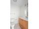 Bathroom features wood vanity, tile floors, and ample natural light, creating a functional and inviting space at 101 Grand Plaza Dr # G30, Orange City, FL 32763