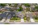 Aerial view of a home with a pool and well-maintained lawn, nestled among other houses in a residential neighborhood at 1020 Hornbeam St, Oviedo, FL 32765
