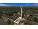 Aerial view of home with pool and fenced yard in a residential neighborhood with mature trees at 1020 Hornbeam St, Oviedo, FL 32765