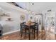 Dining room with a stylish table set and decorative shelving adds charm to the space at 1020 Hornbeam St, Oviedo, FL 32765