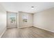 Bright, airy bedroom with two windows and vinyl flooring at 109 Bel Fiore Cv, Sanford, FL 32773