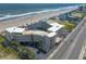 Beautiful aerial view of condo building with oceanfront access and parking available at 1233 N Atlantic Ave # 3090, Daytona Beach, FL 32118