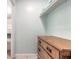 Well-organized closet space with shelves and a dresser, maximizing storage in a compact area at 1233 N Atlantic Ave # 3090, Daytona Beach, FL 32118
