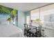 Cozy living space with a dining area offering ocean views, complemented by a calming coastal ambiance at 1233 N Atlantic Ave # 3090, Daytona Beach, FL 32118