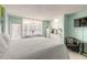 Studio layout featuring a queen bed, a full kitchenette, a sitting area, and views of the ocean at 1233 N Atlantic Ave # 3090, Daytona Beach, FL 32118