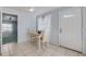 Cozy dining area with tiled floors and a doorway leading to another room at 128 Oakridge Ave, Edgewater, FL 32132
