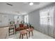 Spacious living room with tile floors, ample natural light, and comfortable seating at 128 Oakridge Ave, Edgewater, FL 32132