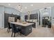 Spacious kitchen with island, stainless steel appliances, and modern finishes at 1446 Stone Trl, Enterprise, FL 32725