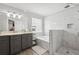 Luxurious bathroom featuring a soaking tub, a glass-enclosed shower, and a double vanity for convenience at 1491 Nappa Dr, Port Orange, FL 32128