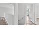 Hallway with neutral walls and floors leading to multiple rooms at 1491 Nappa Dr, Port Orange, FL 32128